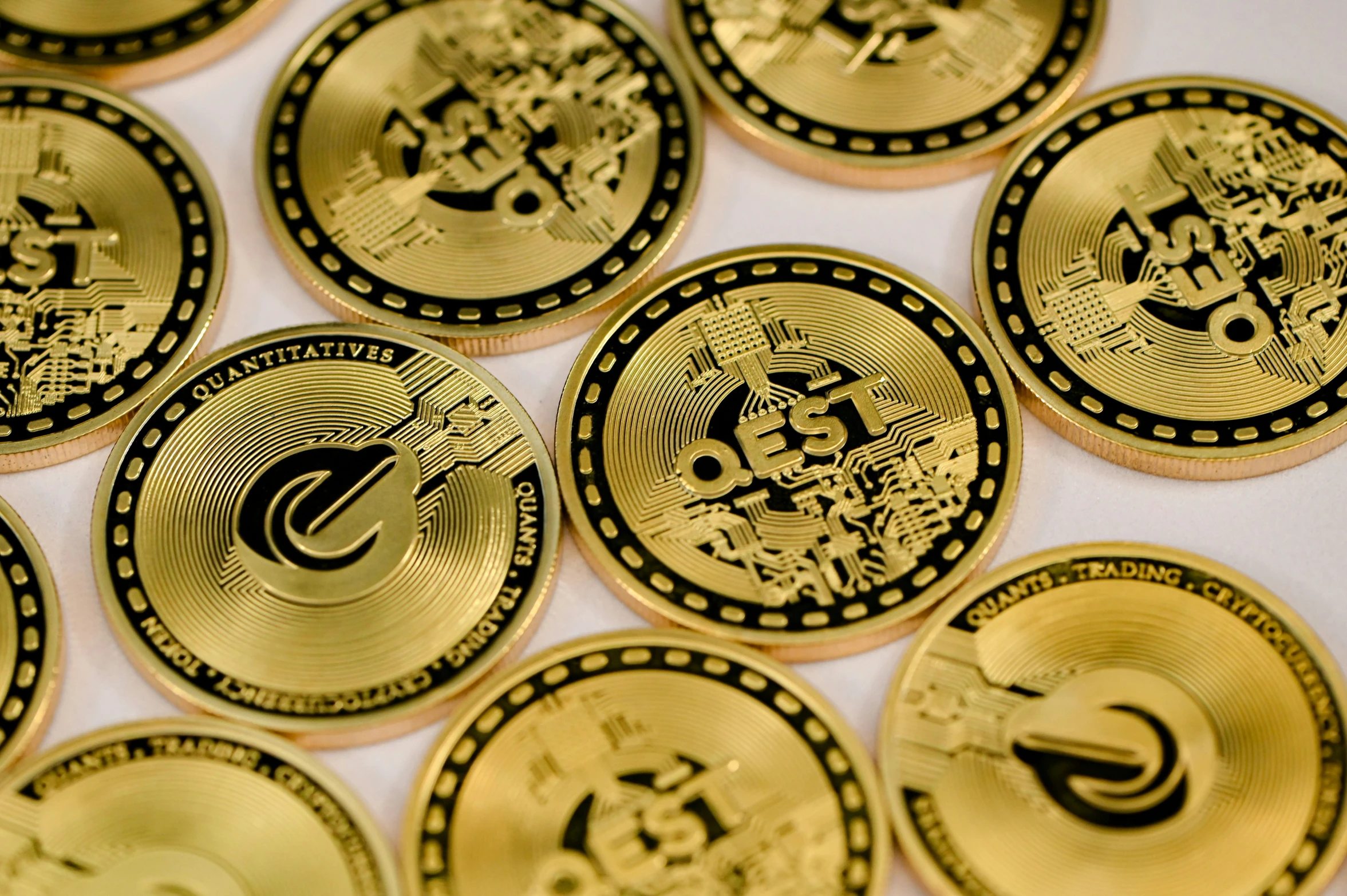 gold coin shapes on top of a white table