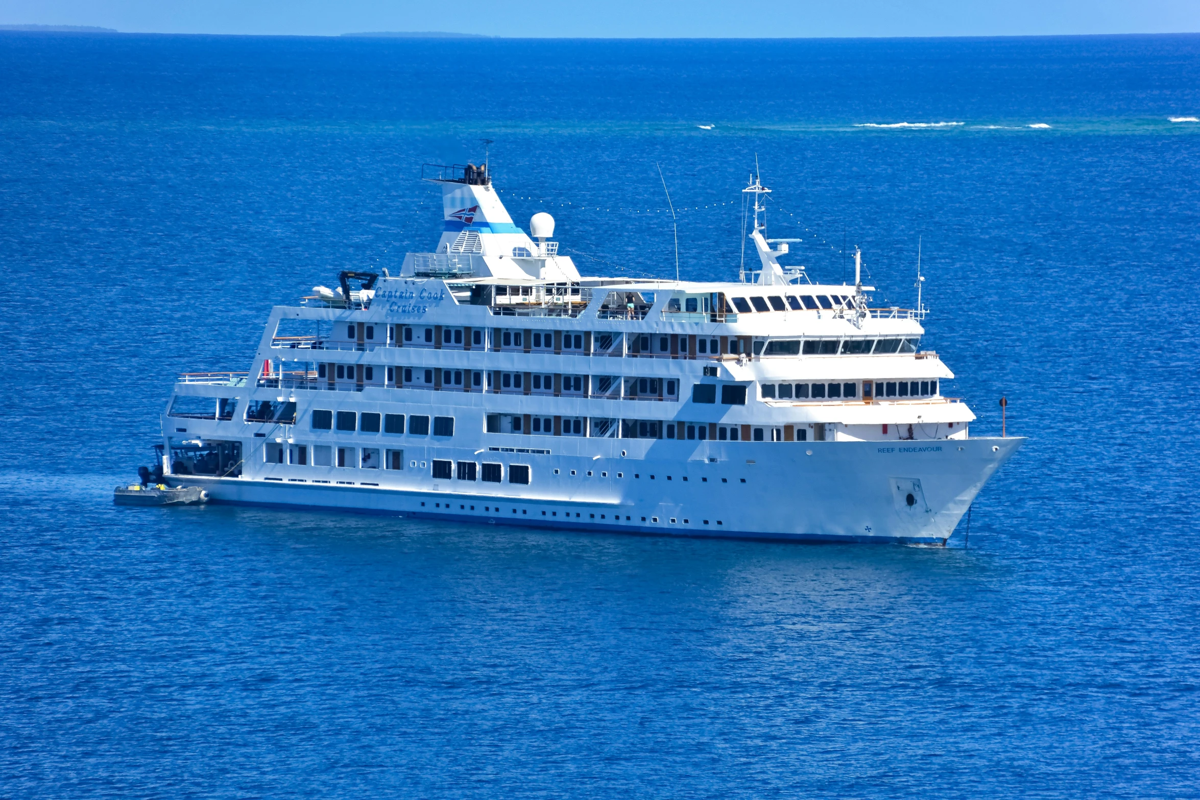 a large boat sailing in the open water