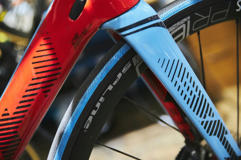 the back end of a bicycle with spokes and gears