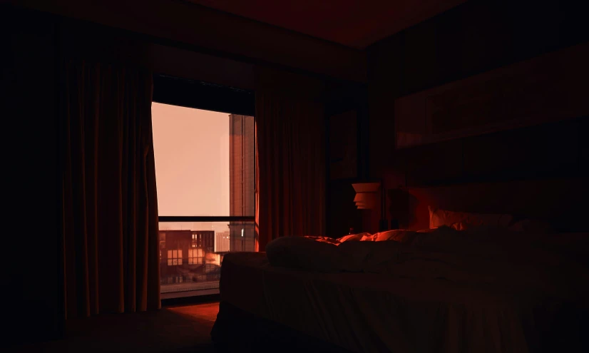 an image of a bedroom with the sun coming through the window