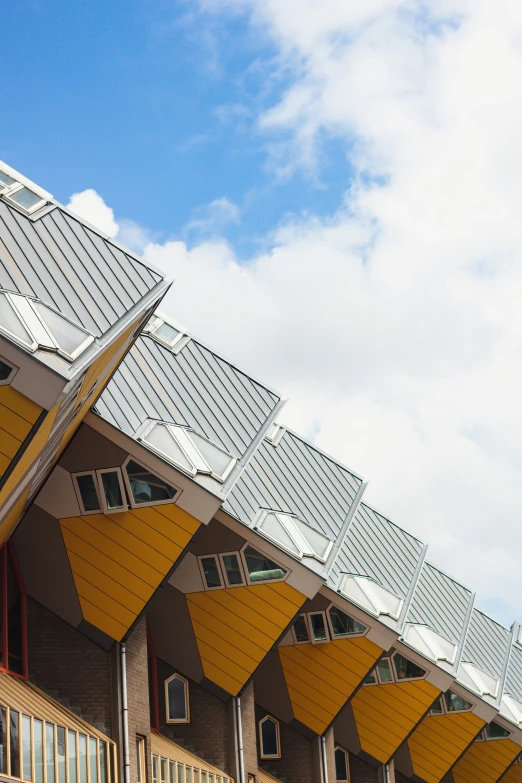 many windows with metal screens on them at a building