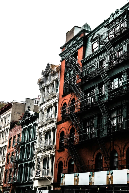 a group of buildings that has stairs going up them