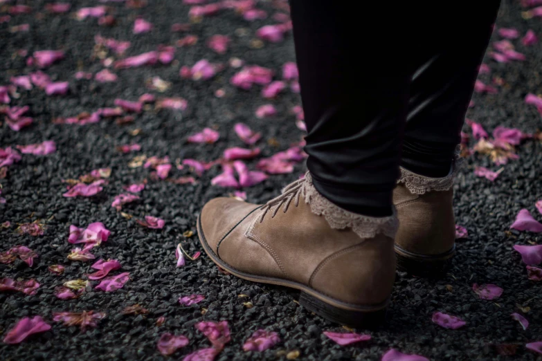 a close up of a person with shoes on