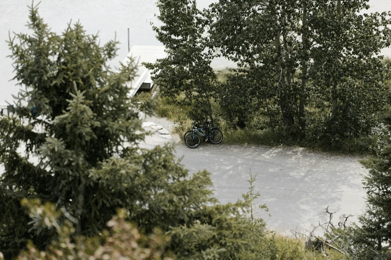 a lone motorcycle is parked in the snow