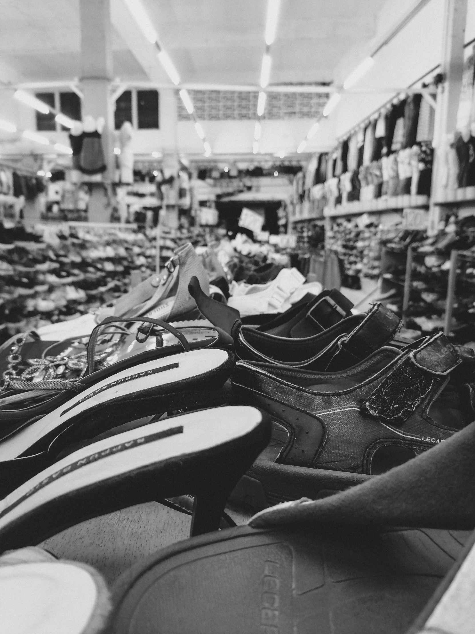 a shoe store display filled with various sneakers