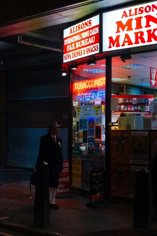 a couple of people stand outside a food store