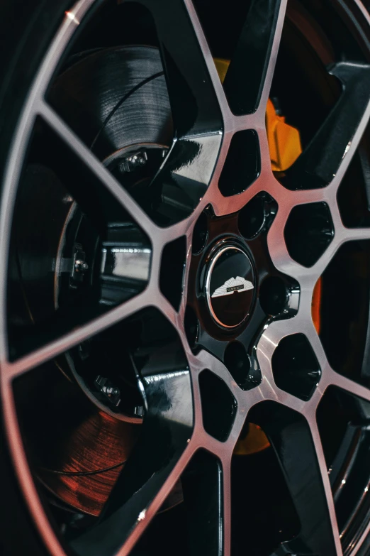 a wheel that has been painted black and red