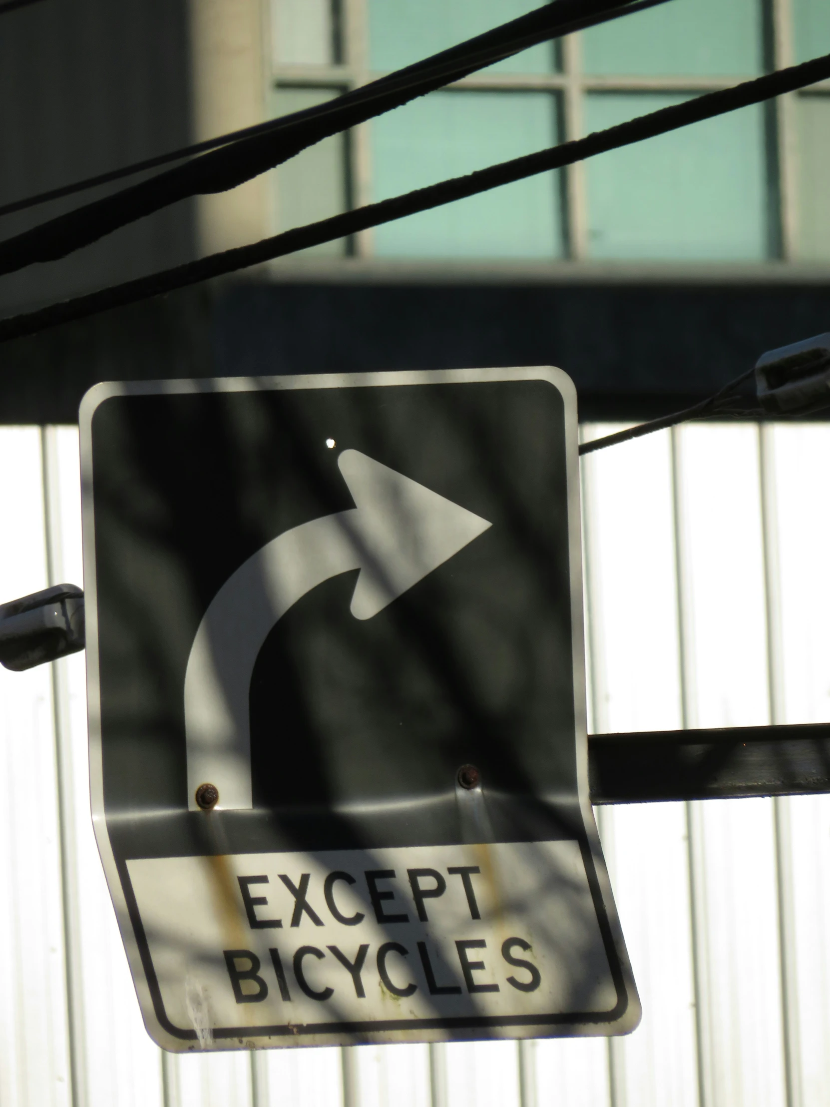 a close up of a sign on a pole