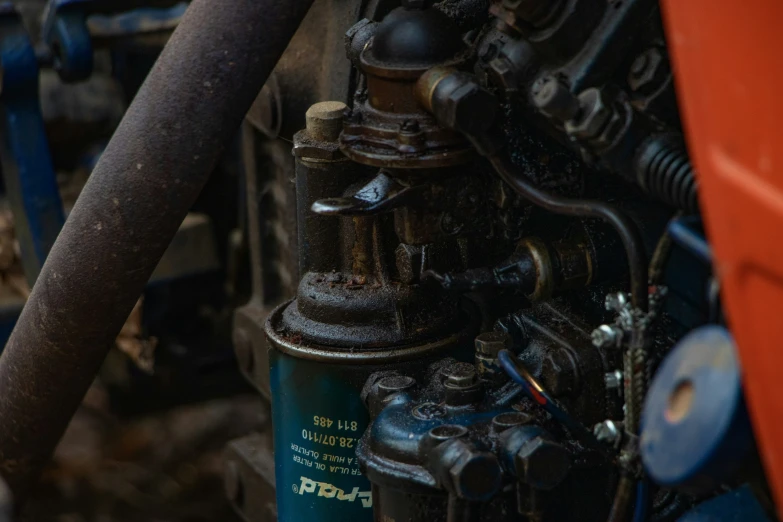 close up of a water pressurer near some pipes