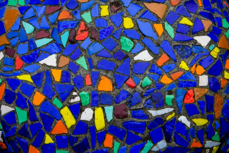 a multicolored glass and stone mosaic is pictured