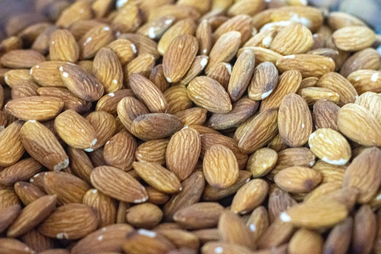 there are almonds being served and stacked together