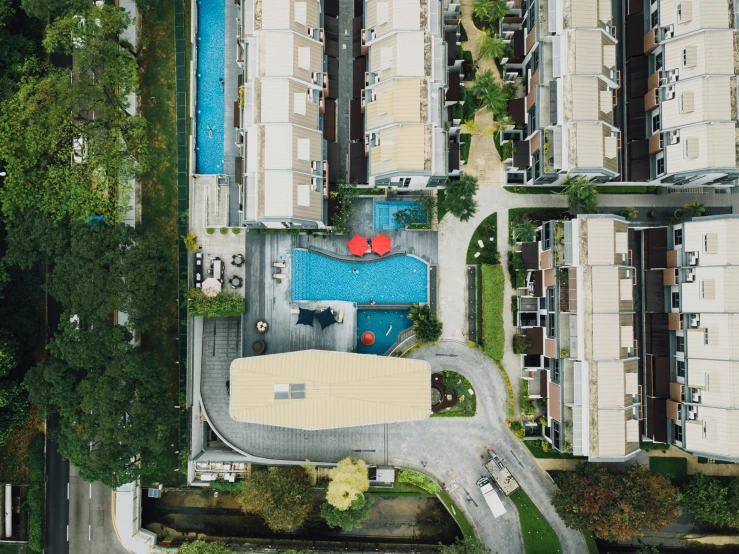 overhead view of a swimming pool at a condom complex