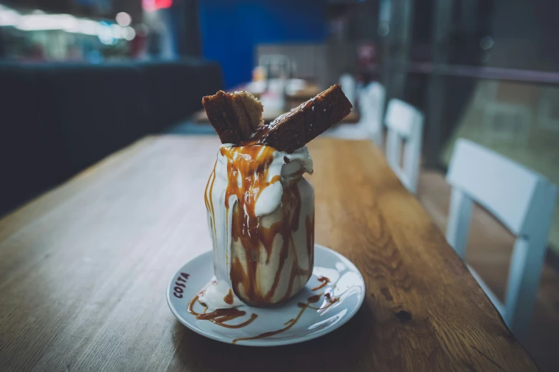 a dessert cup is sitting on the table