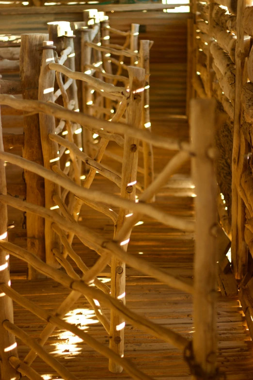 some kind of bamboo fence on a wooden platform