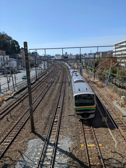 a train is passing through an area next to other tracks