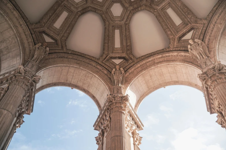 two ornate sculptures in the center of a building