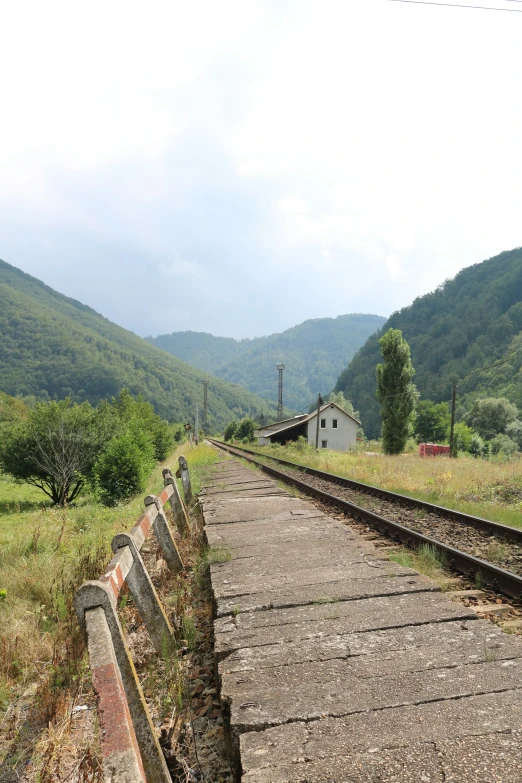 there is a train track going through the mountains