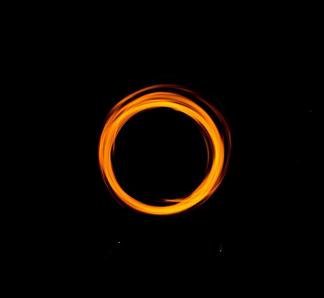 an orange ring against a black background