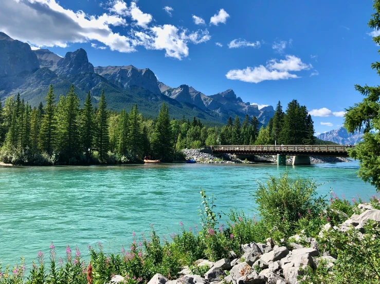 the mountains and water are very blue in this view