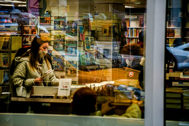 a store front with some people in the background