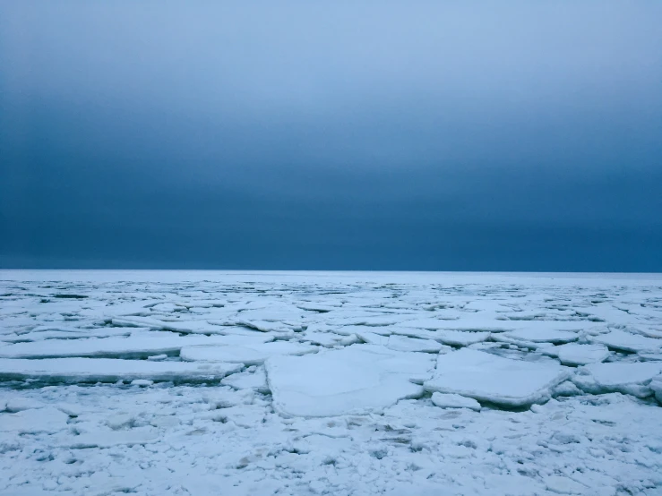 an image of an icy landscape with ice flakes