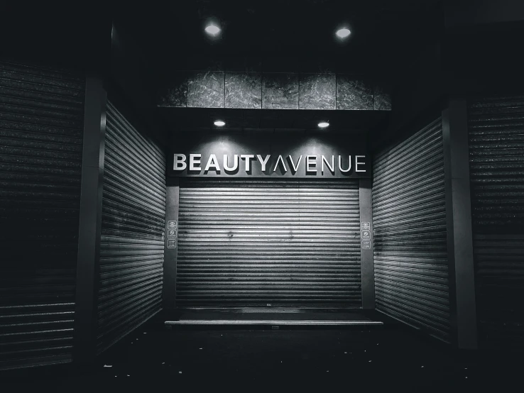 a black and white po with the words beauty avenue on the door