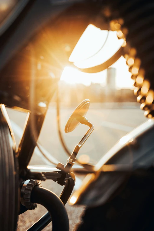 a bike with a handlebar sits in the sun