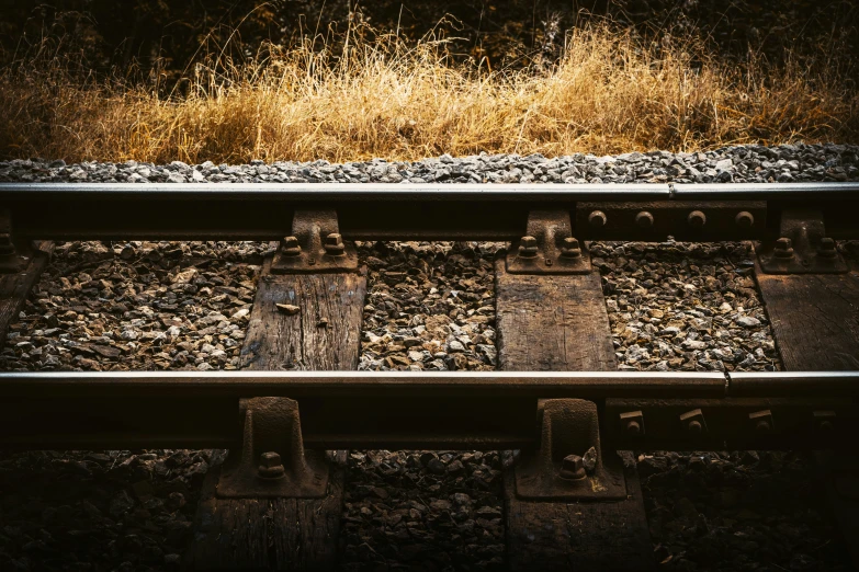 some train tracks are running along side each other