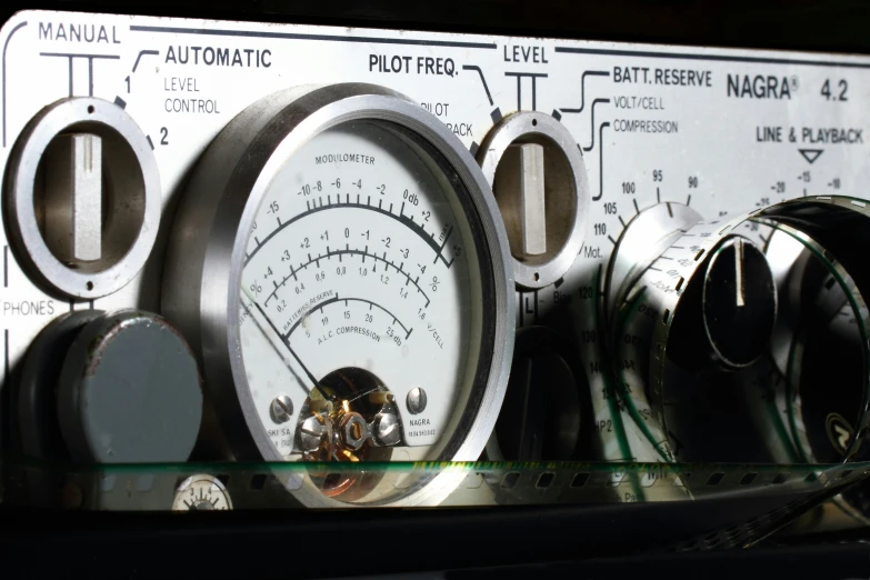 close up view of gauges, the meter and mechanical control panels