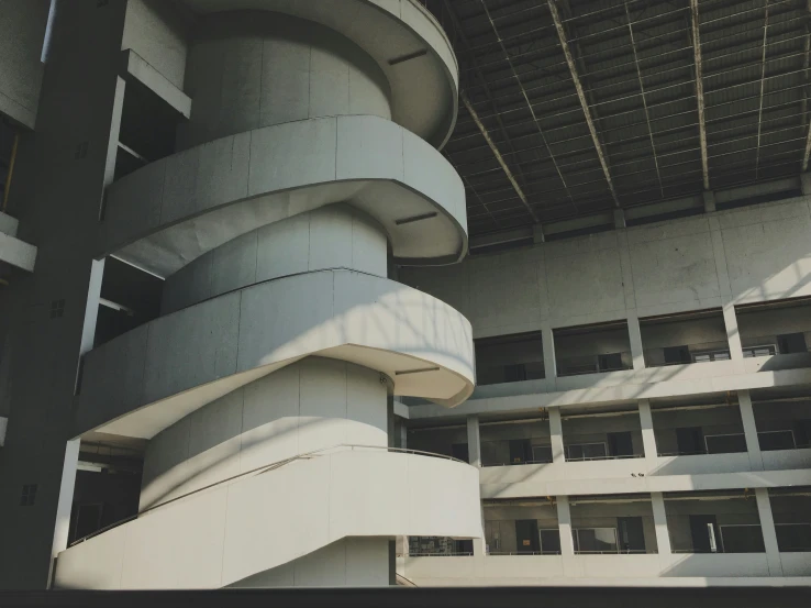 an artful building with many balconies on top