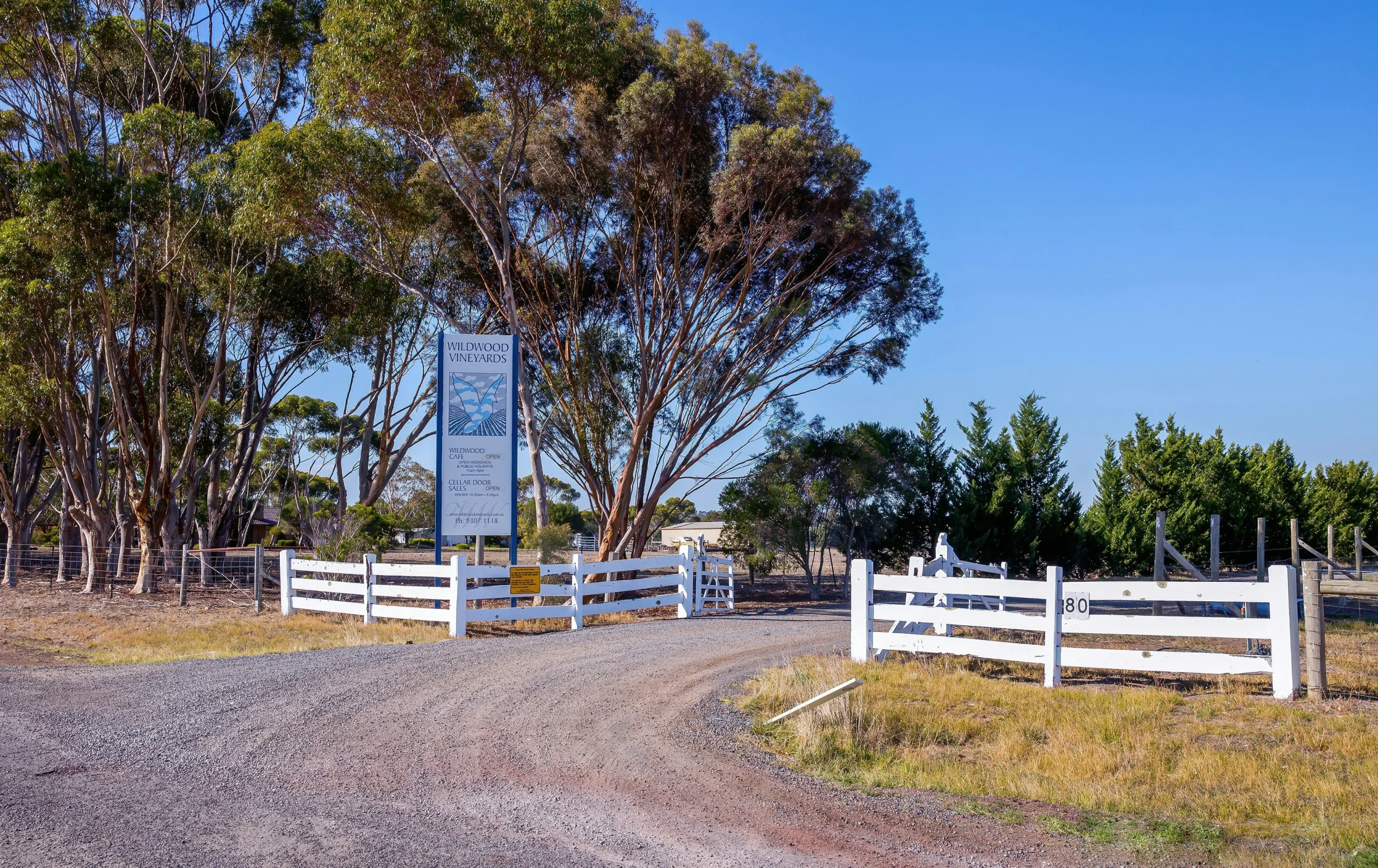 a large field with two fenced in areas