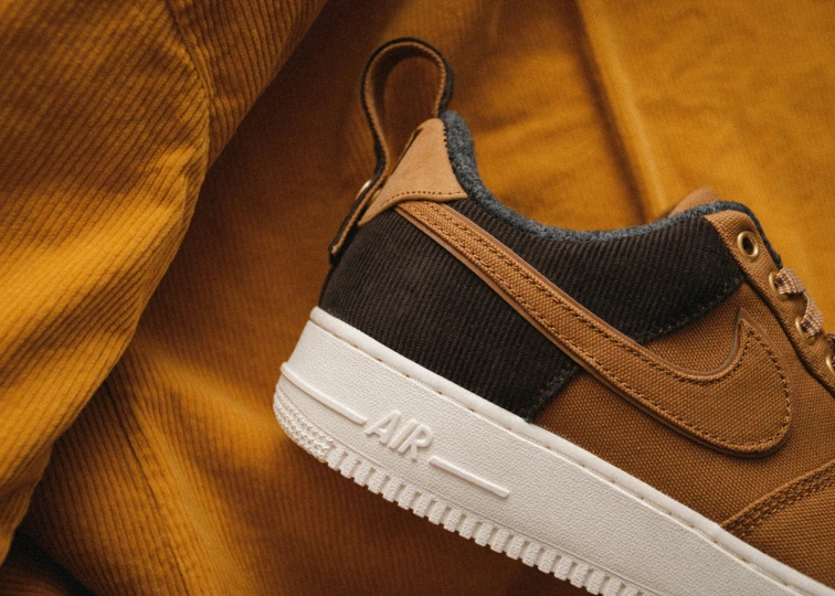 a close up view of a brown nike air force low