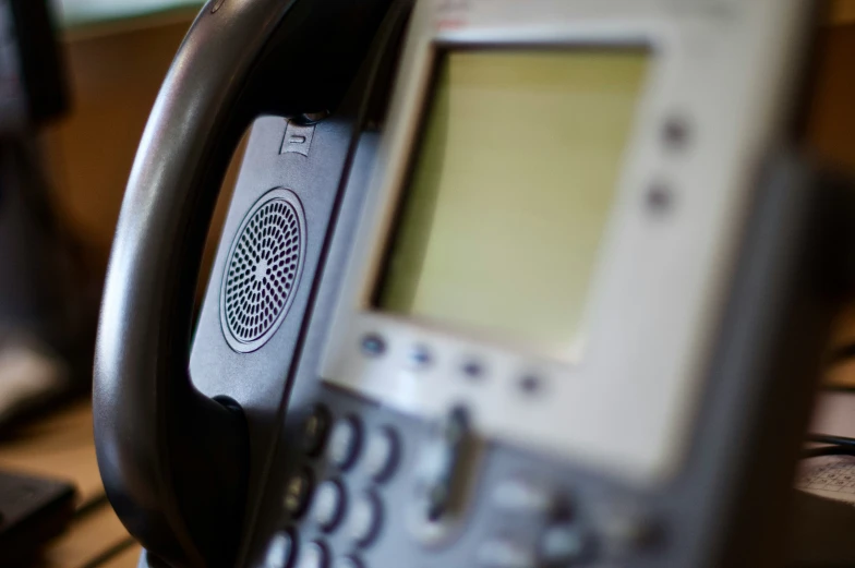 a close - up of a phone and a headset