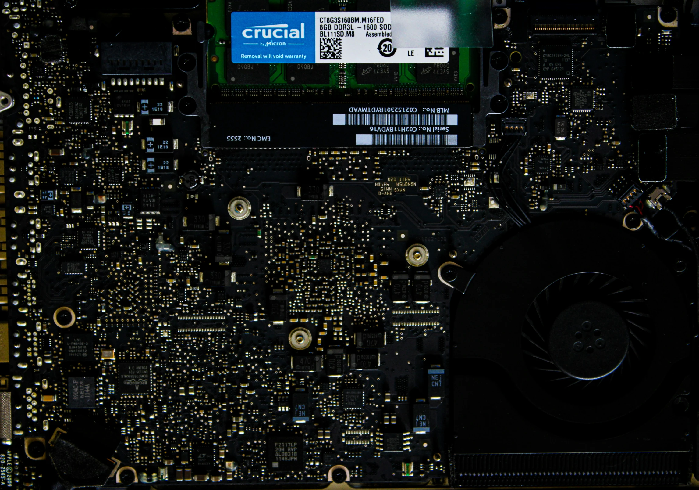 a close up of a computer board with the cpu chip