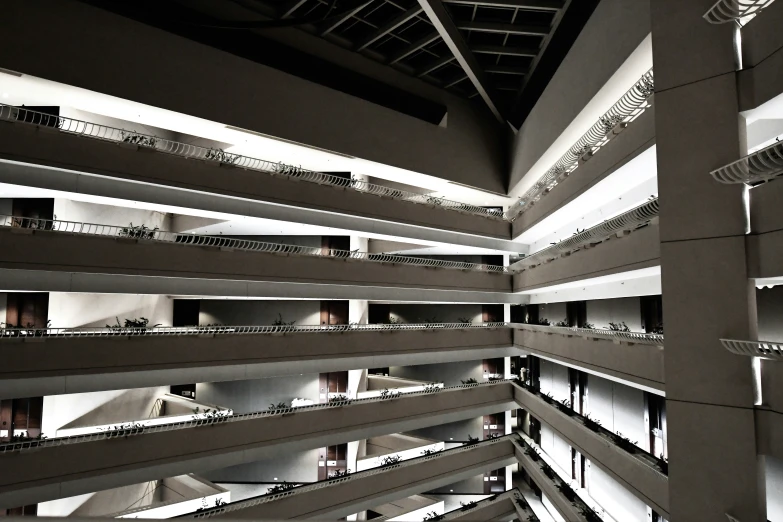 the inside of a building with large windows