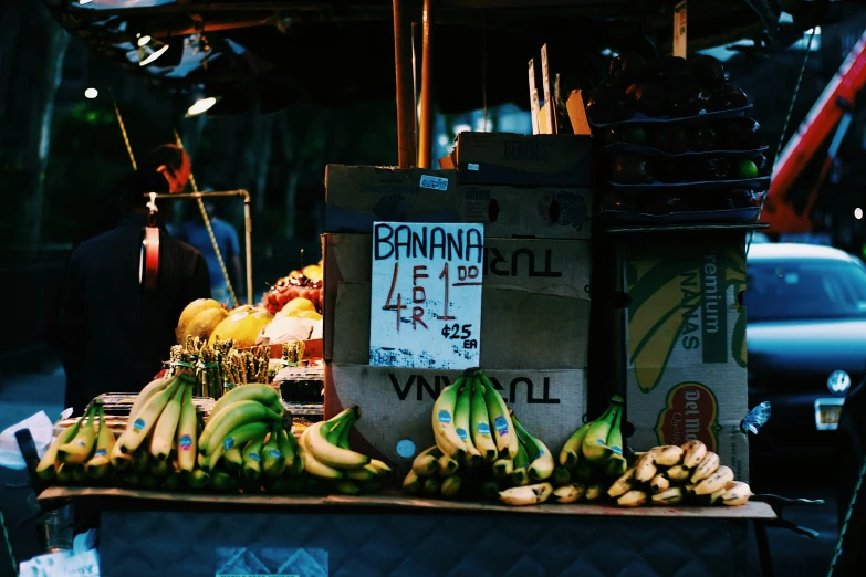 a bunch of bananas are set out on display at the market