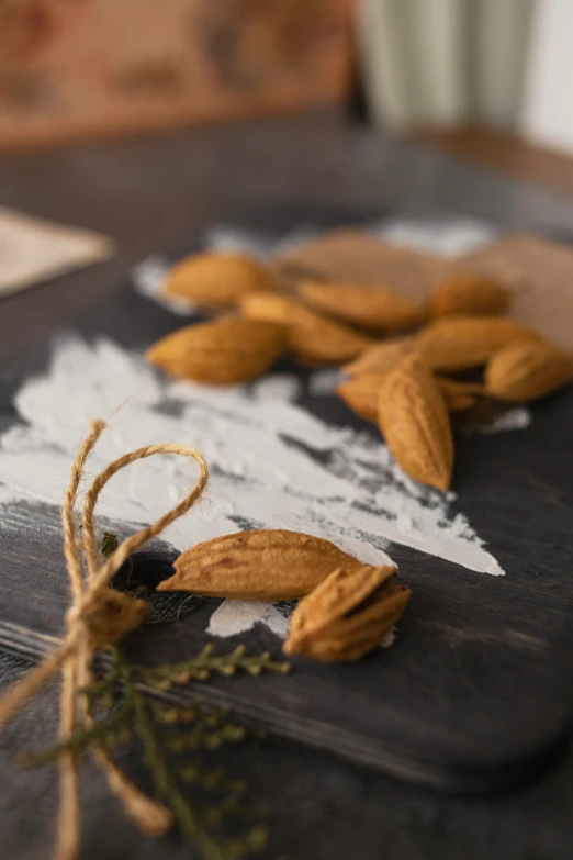 nuts that have been tied on a board