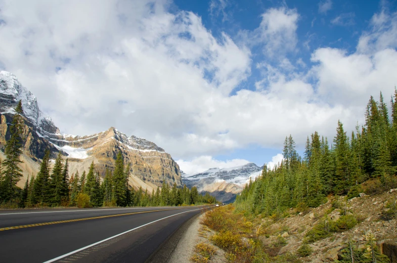 a scenic view of the mountains and trees