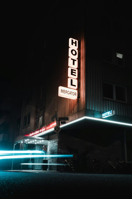 neon light streaks at the front of a el sign