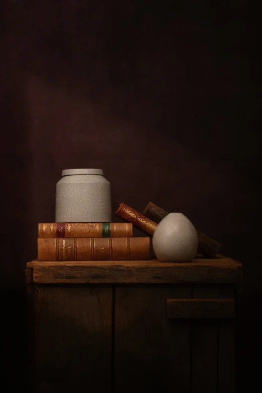 books and a bowl on a table