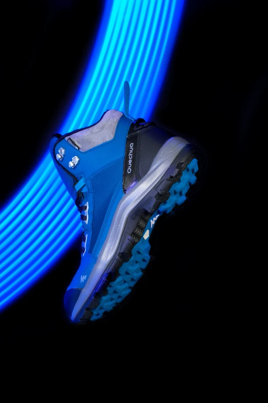 a pair of running shoes against an image of a blue and white circular