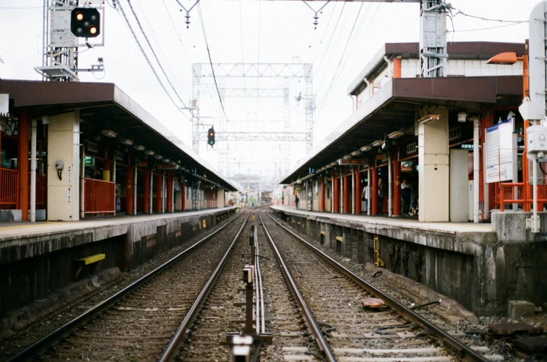 a couple of trains that are sitting on some tracks