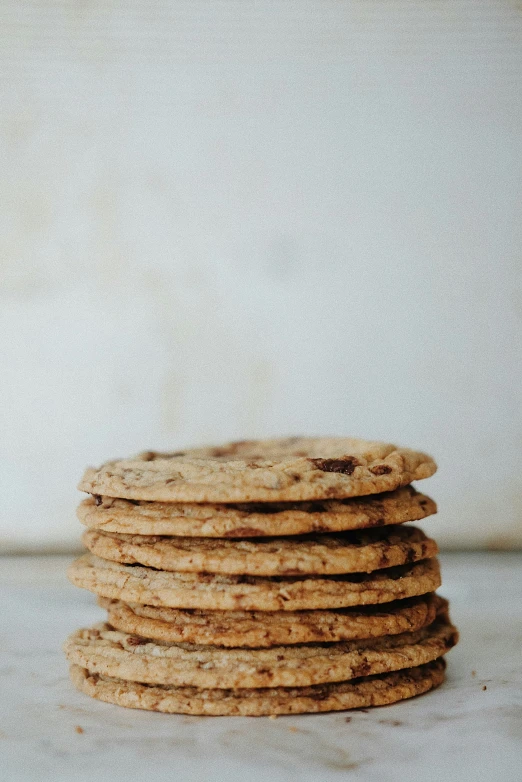 several oatmeal cookies piled high in a stack