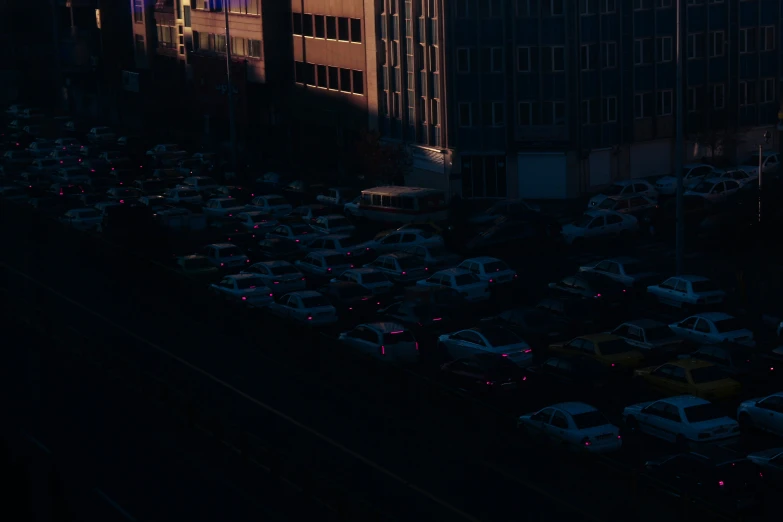 cars are parked in a row in the parking lot