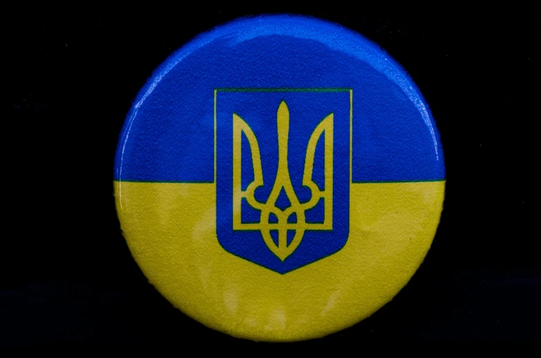 the flag of ukraine is on the badge for those government