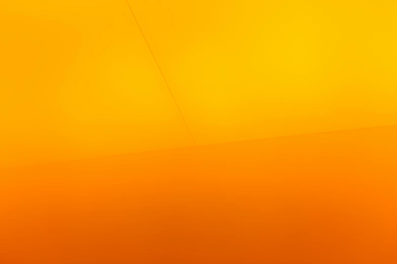 an orange background with two birds on top of one