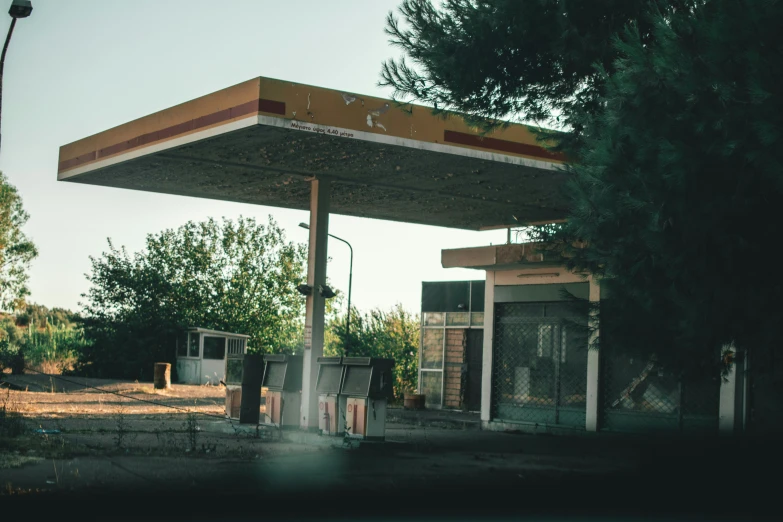 the building has a gas pump on the roof