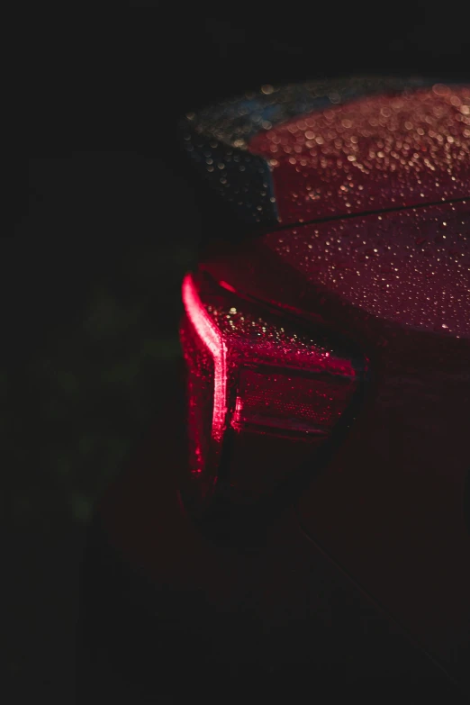 an image of the side of a car that is covered in water