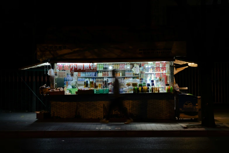 an open market with lights on at night