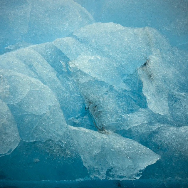 a close up of water with some ice chunks